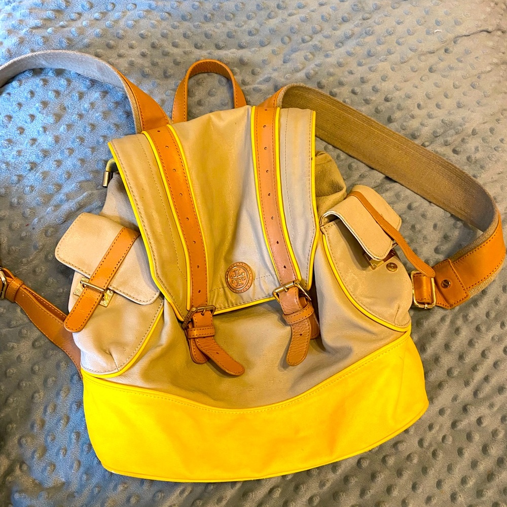 Tory Burch Boy Scout inspired backpack purse with side and inside compartments.